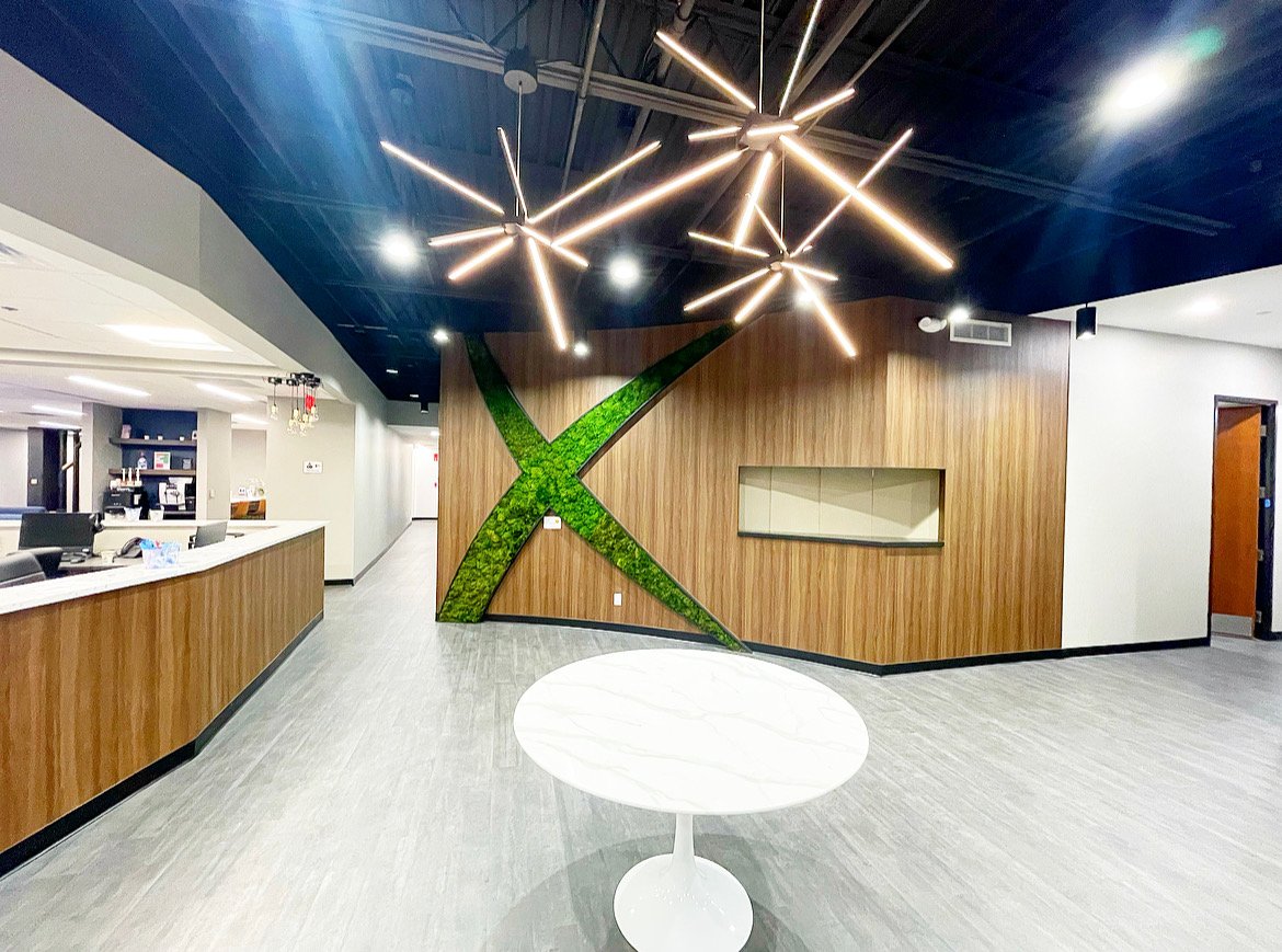 Moss Wall in the shape of an "x" in Axon Health Associates lobby located in Indianapolis, Indiana