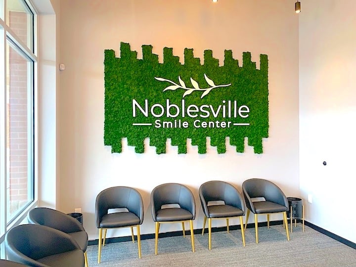 Noblesville Smile Center Dentist Office Logo Moss Wall near Noblesville, Indiana